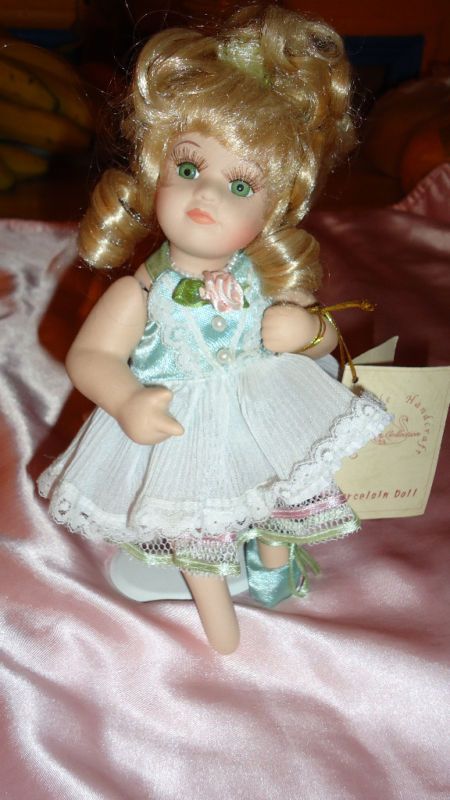 SWAN COLLECTION PORCELAIN DOLL BY JANN LEE  