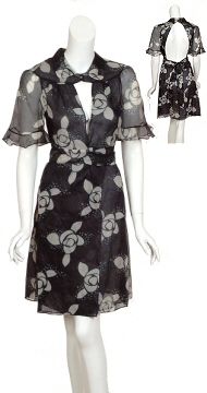 Feminine floral wrap dress in semi transparent silk organza. Features 