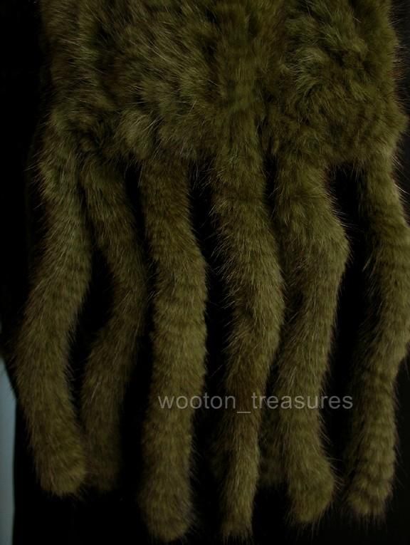 This stole is made of strips of mink fur knitted into a loose mesh 