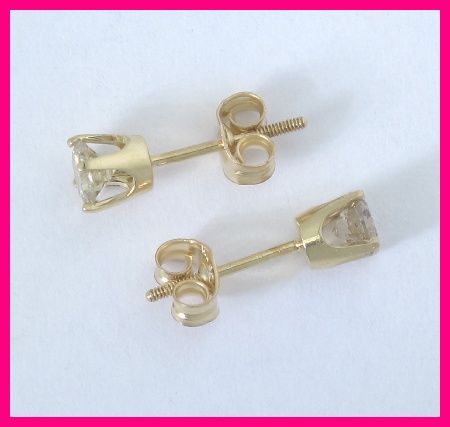 ladies 14kyg round cut diamond solitaire stud earrings 50 carats