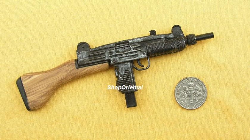 This model is plastic. 16 scale only, not real gun, cannot shoot.